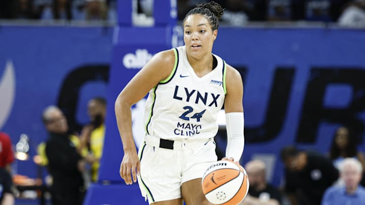 Jul 12, 2025; Chicago, Illinois, USA; Minnesota Lynx forward Napheesa Collier (24) brings the ball up court against the Minnesota Lynx during the first half of a WNBA game at Wintrust Arena. Mandatory Credit: Kamil Krzaczynski-Imagn Images