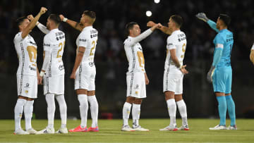 Pumas players prior to a game.