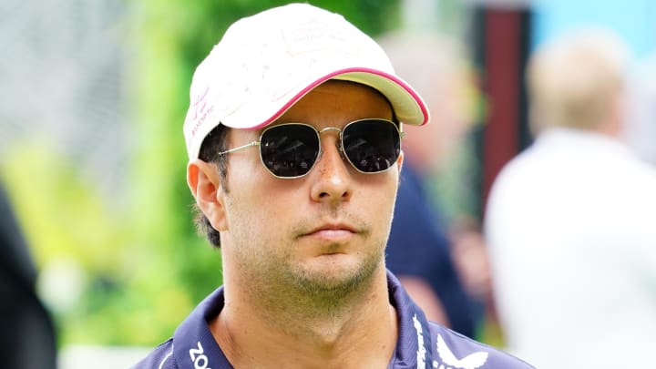 May 5, 2024; Miami Gardens, Florida, USA; Red Bull Racing driver Sergio Perez (11) arrives in the paddock before the Miami Grand Prix at Miami International Autodrome. Mandatory Credit: John David Mercer-USA TODAY Sports