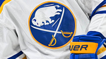 Nov 22, 2022; Montreal, Quebec, CAN; View of a Buffalo Sabres logo on a jersey worn by a member of the team during warm-up before the game against the Montreal Canadiens at Bell Centre. Mandatory Credit: David Kirouac-Imagn Images