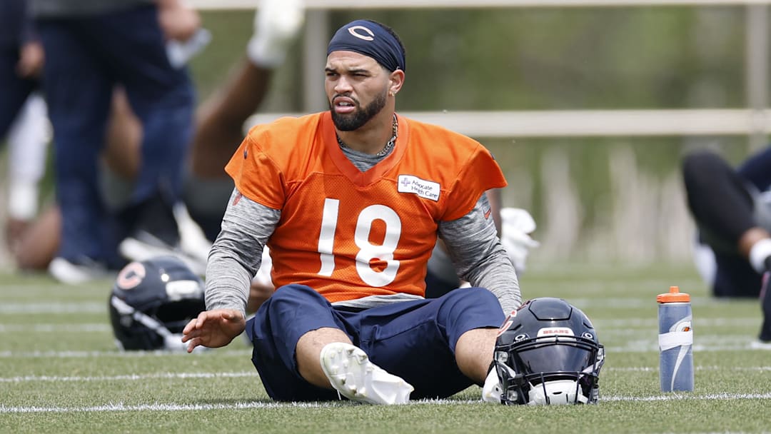 Jun 3, 2025; Lake Forest, IL, USA; Chicago Bears quarterback Caleb Williams (18) warms up during minicamp at Halas Hall. Mandatory Credit: Kamil Krzaczynski-Imagn Images