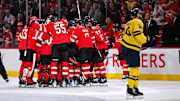Feb 12, 2025; Montreal, Quebec, CAN; [Imagn Images direct customers only] Team Canada players celebrate a win against Team Sweden in overtime during a 4 Nations Face-Off ice hockey game at Bell Centre. Mandatory Credit: David Kirouac-Imagn Images