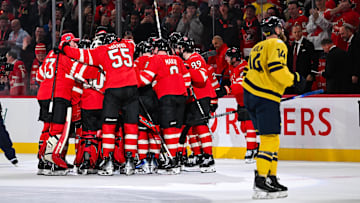 Feb 12, 2025; Montreal, Quebec, CAN; [Imagn Images direct customers only] Team Canada players celebrate a win against Team Sweden in overtime during a 4 Nations Face-Off ice hockey game at Bell Centre. Mandatory Credit: David Kirouac-Imagn Images