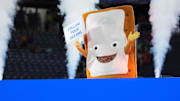 The Cinnamon Pop-Tart mascot goes into a toaster to be toasted after the Iowa State Cyclones defeatied the Miami Hurricanes at Camping World Stadium. 