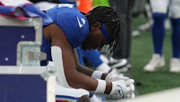East Rutherford, NJ -- November 24, 2024 -- Malik Nabers of the Giants on the bench late in the fourth quarter as the Tampa Bay Buccaneers came to MetLife Stadium and defeated the New York Giants 30-7.