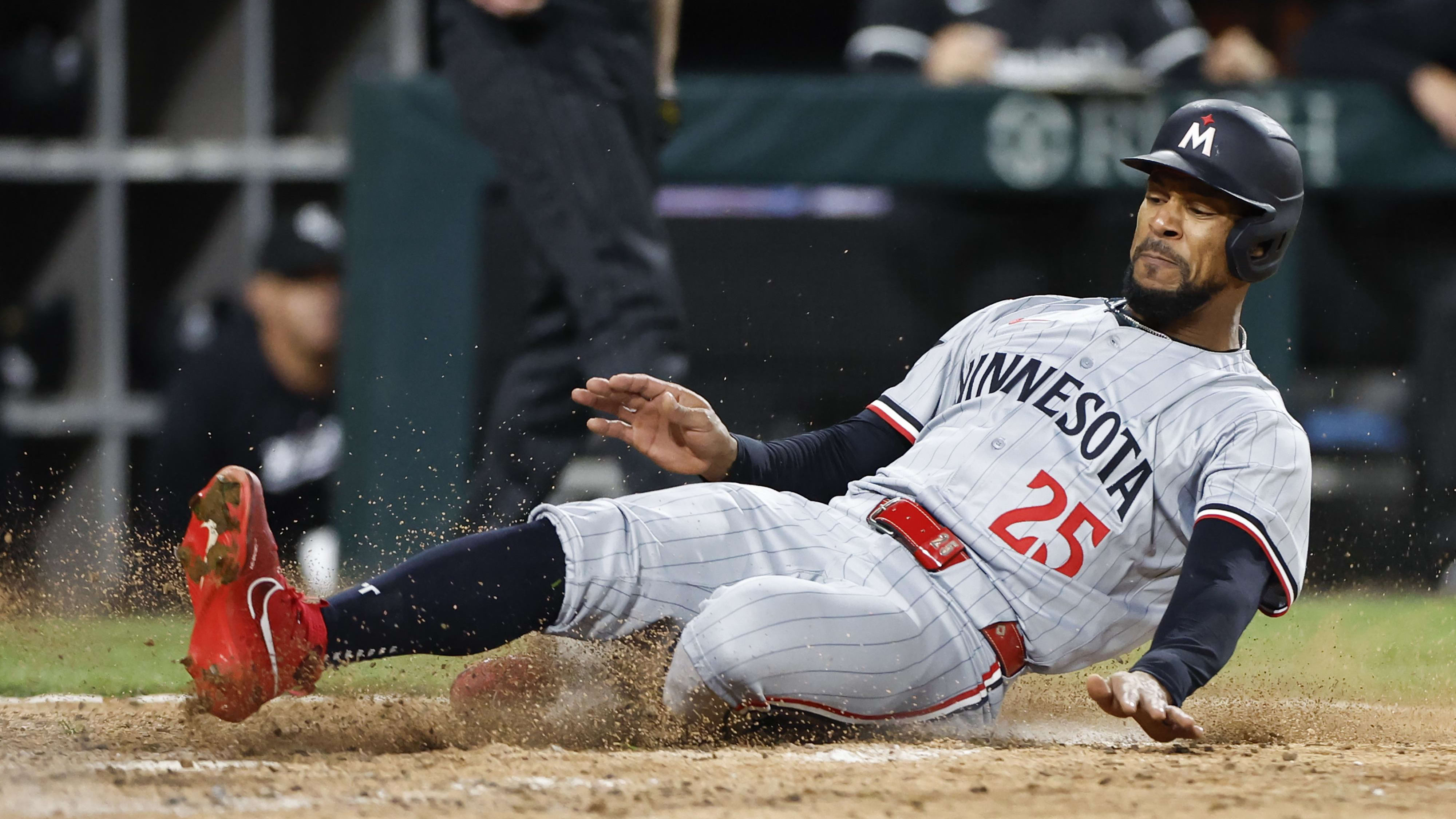 Apr 12, 2024; Baltimore, Maryland, USA; Milwaukee Brewers coach Rickie Weeks Jr. (center).