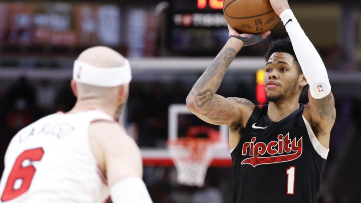 Mar 18, 2024; Chicago, Illinois, USA; Portland Trail Blazers guard Anfernee Simons (1) shoots against the Chicago Bulls during the second half at United Center. Mandatory Credit: Kamil Krzaczynski-USA TODAY Sports