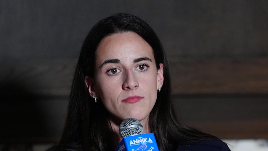 Indiana Fever guard Caitlin Clark speaks at a press conference.
