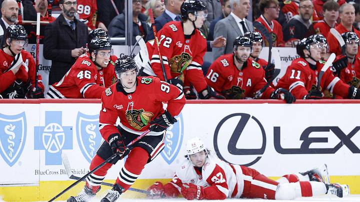 Dec 13, 2025; Chicago, Illinois, USA; Chicago Blackhawks center Frank Nazar (91) looks to pass the puck against the Detroit Red Wings during the second period at United Center. Mandatory Credit: Kamil Krzaczynski-Imagn Images
