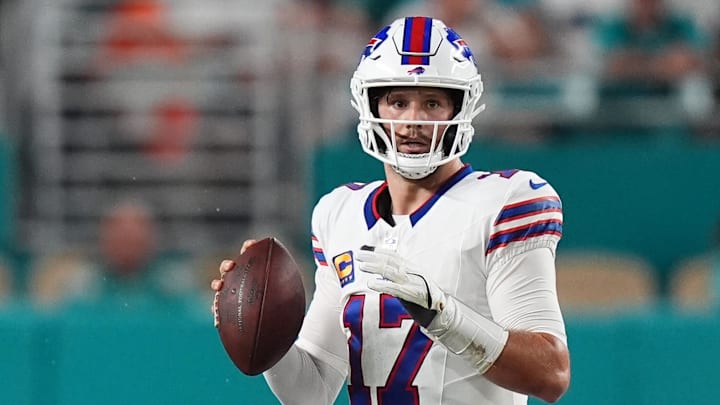 Sep 12, 2024; Miami Gardens, Florida, USA; Buffalo Bills quarterback Josh Allen (17) drops back with the ball during the first half against the Miami Dolphins at Hard Rock Stadium. Mandatory Credit: Jasen Vinlove-Imagn Images
