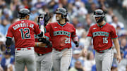 Apr 18, 2025; Chicago, Illinois, USA; Arizona Diamondbacks third baseman Eugenio Suarez (28) celebrates with teammates after hitting a grand slam against the Chicago Cubs during the eight inning at Wrigley Field. Mandatory Credit: Kamil Krzaczynski-Imagn Images