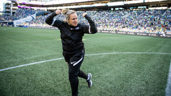 Laura Harvey on the field at Portland Thorns FC v OL Reign