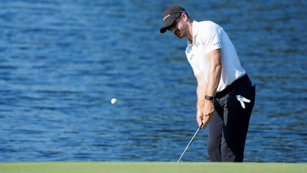 Patrick Rodgers hits a shot up onto the green on the ninth hole during the second day of the FedEx St. Jude Championship 