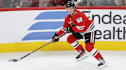 Oct 19, 2025; Chicago, Illinois, USA; Chicago Blackhawks center Connor Bedard (98) looks to pass the puck against the Anaheim Ducks during the second period at United Center. Mandatory Credit: Kamil Krzaczynski-Imagn Images