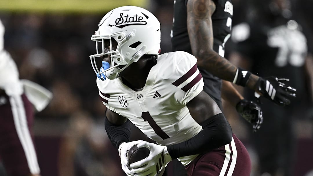 Oct 4, 2025; College Station, Texas, USA; Mississippi State Bulldogs cornerback Kelley Jones (1) runs the ball after catching an interception during the second quarter against the Texas A&M Aggies at Kyle Field. Mandatory Credit: Maria Lysaker-Imagn Images 