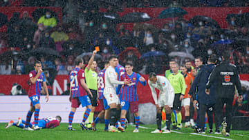 Jules Koundé was sent off in the rain