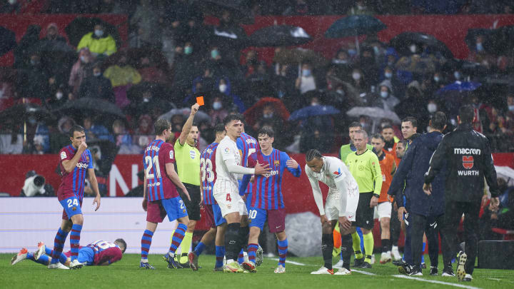 Jules Koundé was sent off in the rain