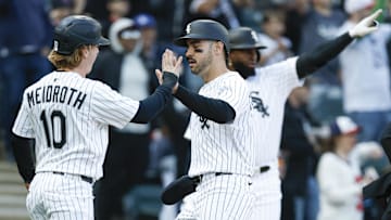 Chicago White Sox shortstop Chase Meidroth (10), right fielder Mike Tauchman (18) and center fielder Luis Robert Jr. against the Texas Rangers at Rate Field. 