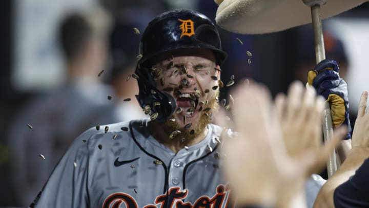 Aug 26, 2024; Chicago, Illinois, USA; Detroit Tigers outfielder Parker Meadows (22) celebrates with teammates after hitting a solo home run against the Chicago White Sox during the seventh inning at Guaranteed Rate Field. 