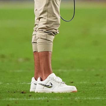 Miami Dolphins head coach Mike McDaniel wears the Travis Scott x Nike Air Force 1 on September 12, 2024.