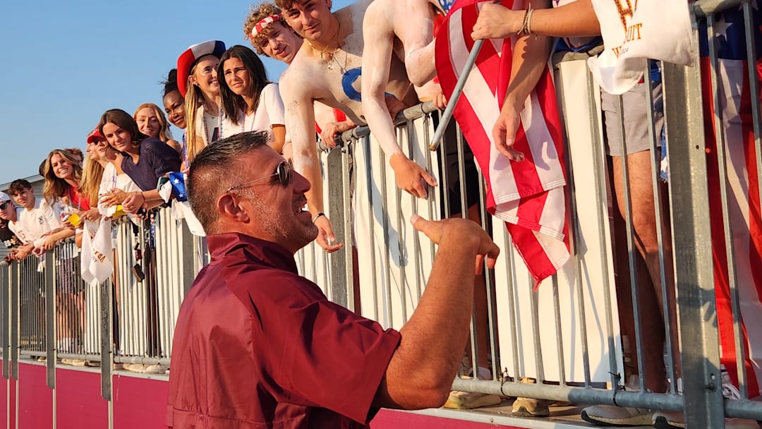 Former Walsh Jesuit standout Mike Vrabel talks to Walsh jesuit students prior to a game against St. Ignatius on September 13, 2024.