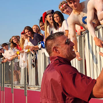 Former Walsh Jesuit standout Mike Vrabel talks to Walsh jesuit students prior to a game against St. Ignatius on September 13, 2024.