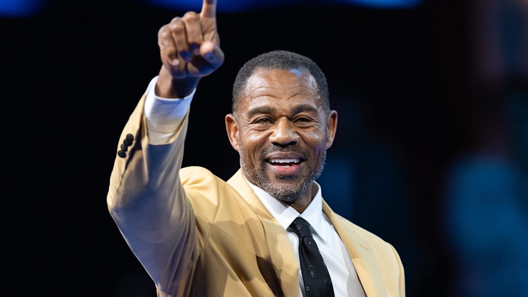 Aug 1, 2025; Canton, OH, USA; Eric Allen points to the crowd after receiving his gold jacket at the 2025 Pro Football Hall of Fame Enshrinees’ Gold Jacket Dinner at Canton Memorial Civic Center. 