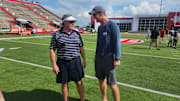 Legendary former NFL coach Bill Belichick talks with Peyton Manning at the 2024 Manning Passing Academy.