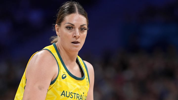 Aug 4, 2024; Villeneuve-d'Ascq, France; Australia forward Cayla George (15) controls the ball against France in the second half in a women’s group B game during the Paris 2024 Olympic Summer Games at Stade Pierre-Mauroy. Mandatory Credit: John David Mercer-Imagn Images