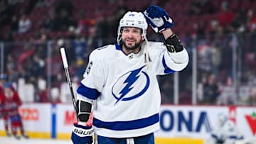Apr 4, 2024; Montreal, Quebec, CAN; Tampa Bay Lightning right wing Nikita Kucherov (86) salutes fans in the crowd during warm-up before the game against the Montreal Canadiens at Bell Centre. Mandatory Credit: David Kirouac-USA TODAY Sports