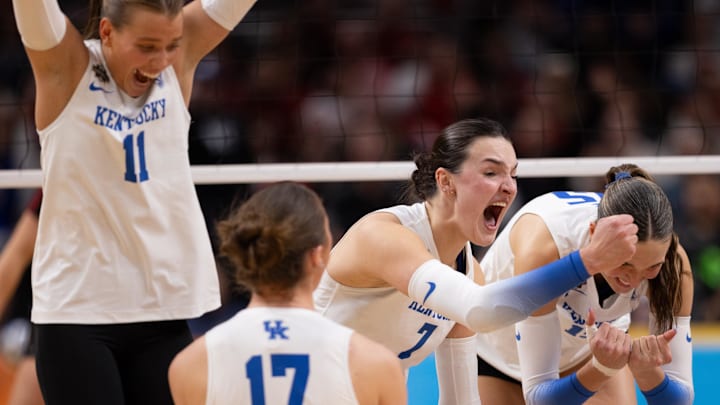 Dec 18, 2025; Kansas City, MO, USA; Kentucky Wildcats outside hitter Eva Hudson (7) celebrates with her teammates after scoring a point in a 2025 NCAA Women’s Volleyball Championship semifinal match at T-Mobile Center. Mandatory Credit: Kylie Graham-Imagn Images