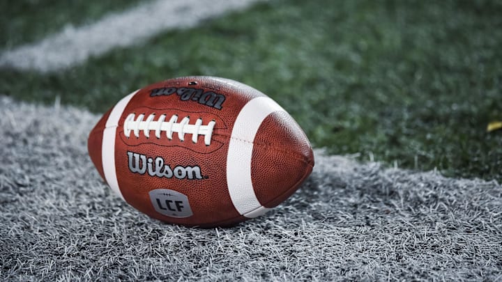 Oct 22, 2021; Montreal, Quebec, CAN; view of a CFL game ball with a french logo on the field before the first quarter during a Canadian Football League game at Molson Stadium. Mandatory Credit: David Kirouac-Imagn Images