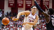 Indiana guard Trey Galloway (32) passes the ball while South Carolina guard Morris Ugusuk (15) defends during a Nov. 16 game in Bloomington, Ind. 