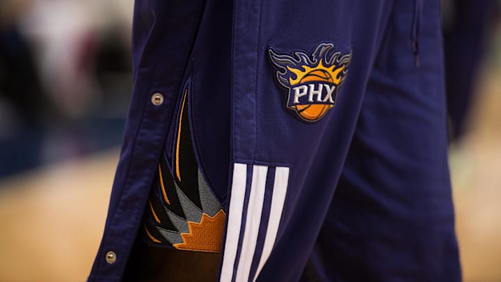 The Phoenix Suns logo before the game between the Dallas Mavericks and the Suns played at the American Airlines Center April 12, 2014.
