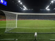 The stadium viewed from behind the goal net during the...