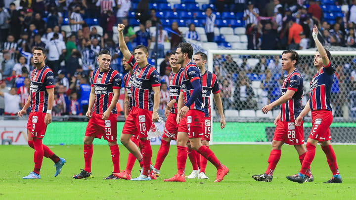 Jugadores de las Chivas del Guadalajara celebran su victoria ante Rayados de Monterrey. Jugadores de las Chivas del Guadalajara celebran su victoria ante Rayados de Monterrey.