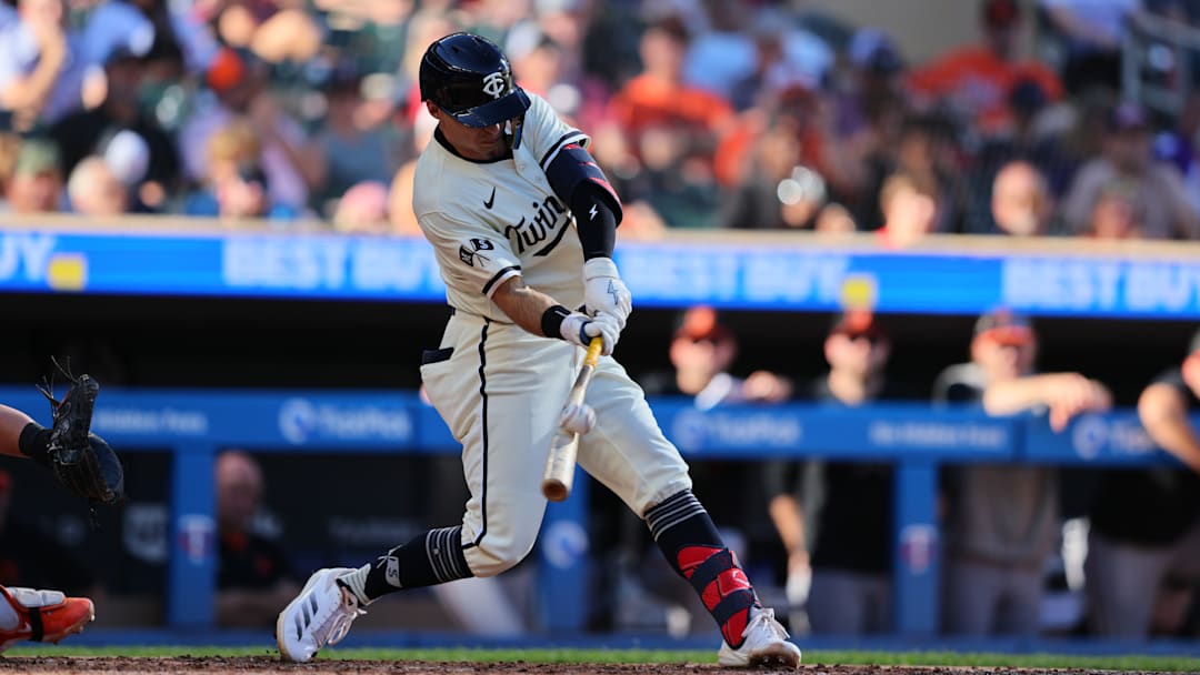 Minnesota Twins outfielder Michael Helman was traded to the St. Louis Cardinals to help clear some 40-man roster space.