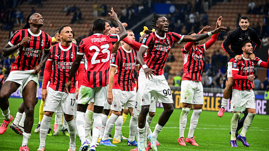 AC Milan players celebrate the victory at the end of the match