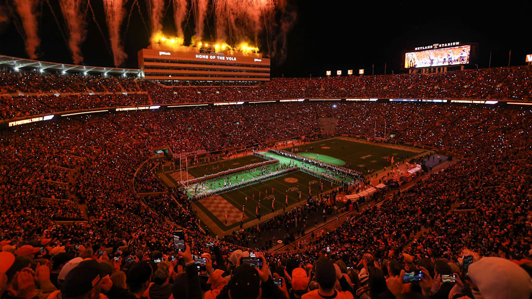Nov 1, 2025; Knoxville, Tennessee, USA; The Tennessee Volunteers run through the T before the game against the Oklahoma Sooners at Neyland Stadium. Mandatory Credit: Randy Sartin-Imagn Images