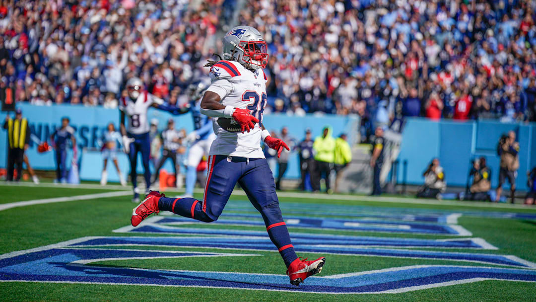 New England Patriots running back Rhamondre Stevenson (38) runs in a touchdown against the Tennessee Titans during the third quarter at Nissan Stadium in Nashville, Tenn., Sunday, Oct. 19, 2025.