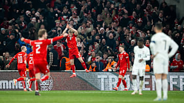 Cristiano Ronaldo looks on as Rasmus Hojlund imitates his celebration