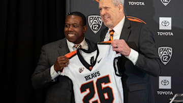 Vice president and director of athletics Scott Barnes, right, introduces JaMarcus Shephard as the new head coach for Oregon State football at Reser Stadium on Tuesday, Dec. 2, 2025, in Corvallis, Ore.