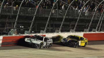 Sep 1, 2024; Darlington, South Carolina, USA; NASCAR Cup Series driver Chase Briscoe (14) leads NASCAR Cup Series driver Kyle Busch (8) during the Cook Out Southern 500 at Darlington Raceway.