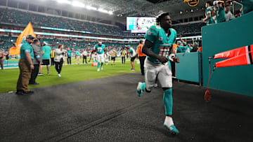 Dec 22, 2024; Miami Gardens, Florida, USA; Miami Dolphins wide receiver Tyreek Hill (10) runs off the field after defeating the San Francisco 49ers at Hard Rock Stadium. 
