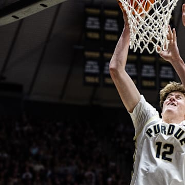Purdue Boilermakers center Daniel Jacobsen (12) shoots the ball 