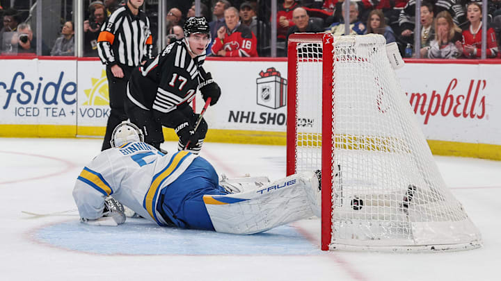 Nov 26, 2025; Newark, New Jersey, USA; New Jersey Devils defenseman Simon Nemec (17) scores the game winning goal against the St. Louis Blues in overtime at Prudential Center. Mandatory Credit: Ed Mulholland-Imagn Images