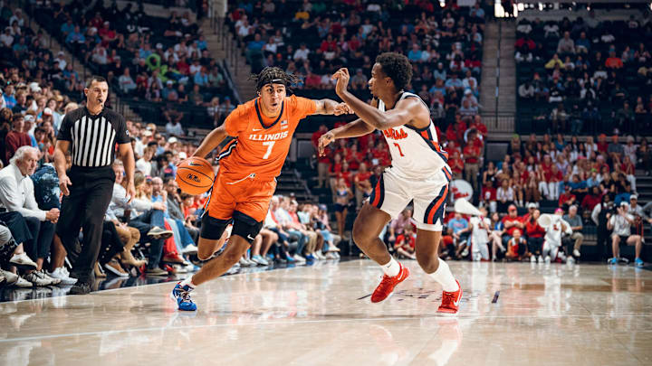 Illinois freshman forward Will Riley (7) drives against Ole Miss guard Davon Barnes (7) in last Sunday's exhibition game in Oxford, Mississippi. Illinois freshman forward Will Riley (7) drives against Ole Miss guard Davon Barnes (7) in last Sunday's exhibition game in Oxford, Mississippi.