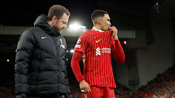 Trent Alexander-Arnold (right) was forced off against PSG on Tuesday night