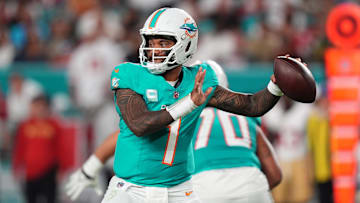 Dec 22, 2024; Miami Gardens, Florida, USA; Miami Dolphins quarterback Tua Tagovailoa (1) attempts a pass against the San Francisco 49ers during second half at Hard Rock Stadium. Mandatory Credit: Jasen Vinlove-Imagn Images