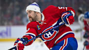 Nov 23, 2024; Montreal, Quebec, CAN; Montreal Canadiens defenseman David Savard (58) looks on wearing a Hockey fights cancer tuque during warm-up before the game against the Las Vegas Golden Knights at Bell Centre. Mandatory Credit: David Kirouac-Imagn Images